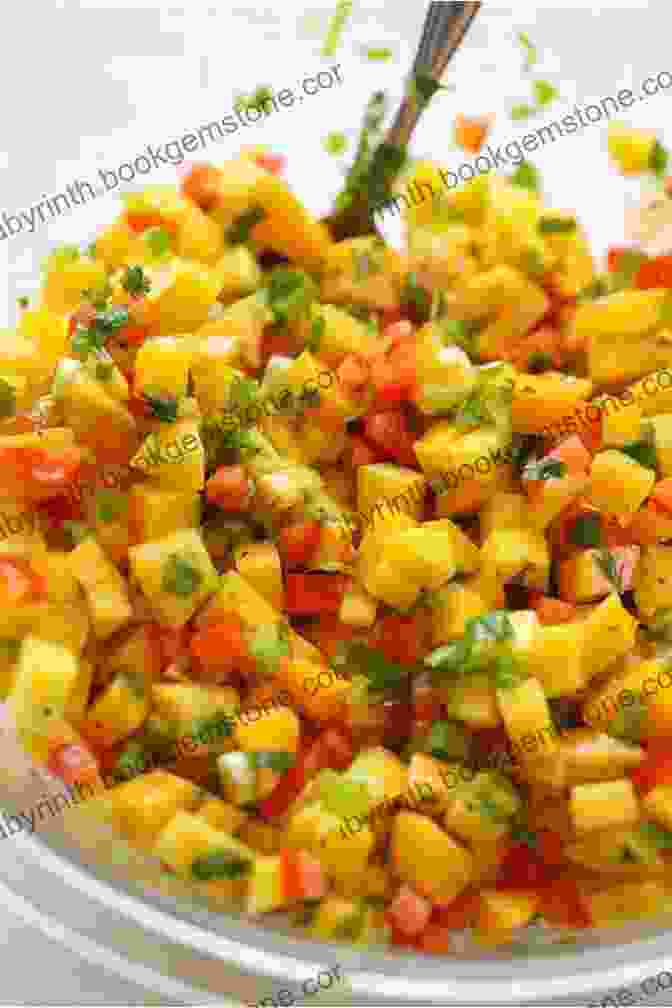 A Bowl Of Mango Salsa, A Belizean Condiment Made From Fresh Mangoes. Most Popular Recipes Direct From Belize: A Cookbook Of Essential Belizean Cuisine
