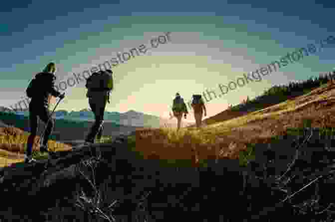 A Group Of People Hiking In The Mountains. 100 Ways To Live A Luxurious Life On A Budget