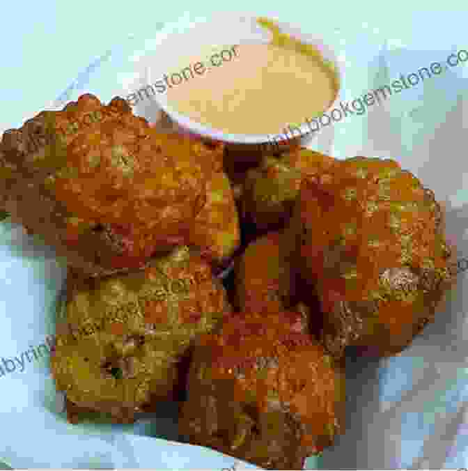A Plate Of Conch Fritters, A Belizean Street Food Made From Conch Meat And Batter. Most Popular Recipes Direct From Belize: A Cookbook Of Essential Belizean Cuisine
